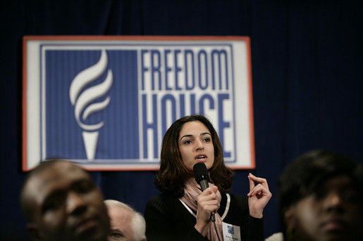 An audience member directs a question to President George W. Bush during his appearance at Freedom House, Wednesday, March 29, 2006 in Washington, where President Bush discussed Democracy in Iraq and thanked the Freedom House organization for their work to expand freedom around the world. White House photo by Eric Draper