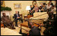 President George W. Bush speaks to the press as they gather Wednesday, March 29, 2006, in the Oval Office for a photo availability with President Olusegun Obasanjo of Nigeria. President Bush thanked President Obasanjo for his leadership and said, "Every time I meet with the President he brings a fresh perspective about the politics and the situation on the continent of Africa." White House photo by Shealah Craighead