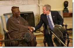 President George W. Bush welcomes Nigerian President Olusegun Obasanjo to the Oval Office Wednesday, March 29, 2006.  White House photo by Shealah Craighead