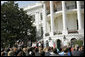 President George W. Bush congratulates 12 2005 and 2006 NCAA Championship teams during a South Lawn ceremony Thursday, April 6, 2006. White House photo by Kimberlee Hewitt