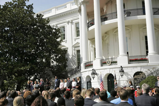 President George W. Bush congratulates 12 2005 and 2006 NCAA Championship teams during a South Lawn ceremony Thursday, April 6, 2006. White House photo by Kimberlee Hewitt