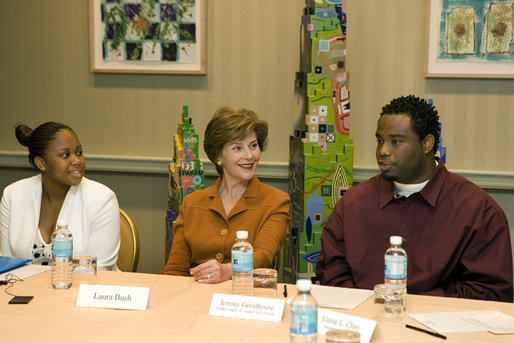 Mrs. Laura Bush listens to Jeremy Greathouse, an unemployed New Orleans youth, and LaToya Dorsha Williams, an Urban League participant, about difficulties of life experiences and employment during a discussion with the National Urban League in New Orleans, La., Monday, April 10, 2006. Urban League affiliate sites are providing youth care-focused employability skills, paid internships, and on-the job training to help participants enter full-time, private sector employment. White House photo by Shealah Craighead