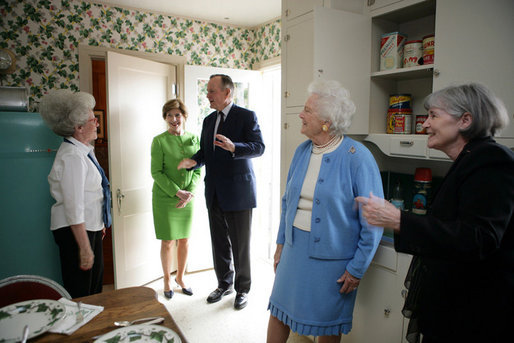 Gayle Dodson, Docent Coordinator, Left, and Dealey Herndon, Restoration/Historian greet Laura Bush, former President George H.W. Bush, and Mrs. Barbara Bush, Tuesday, April 11, 2006, at the beginning of their tour of George W. Bush Childhood Home in Midland, Texas. White House photo by Shealah Craighead