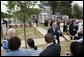 Former President George H.W. Bush and Mrs. Barbara Bush talk with members of the press on April 11, 2006, after the dedication and ribbon cutting ceremony for the opening of President George W. Bush’s Childhood Home in Midland, Texas. White House photo by Shealah Craighead