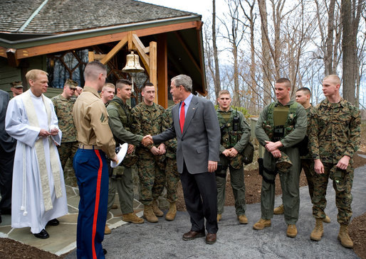 President George W. Bush visits with military personnel after attending a church service at Evergreen Chapel at Camp David, Maryland, Sunday, April 16, 2006. White House photo by Eric Draper