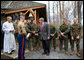 President George W. Bush visits with military personnel after attending a church service at Evergreen Chapel at Camp David, Maryland, Sunday, April 16, 2006. White House photo by Eric Draper