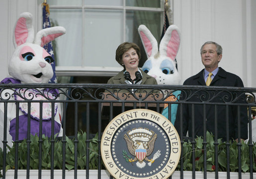 Mrs. Laura Bush and President George W. Bush welcome guests to the 2006 White House Easter Egg Roll, Monday, April 17, 2006, a tradition on the South Lawn of the White House since 1878. White House photo by Paul Morse