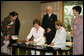 Mrs. Laura Bush, joined by her mother, Mrs. Jenna Welch, right, is given whisking instructions by Ms. Sakiko Akiyama, executive assistant to Grand Master Sen Genshitsu, left, while participating in a Japanese Tea Ceremony, Monday, April 17, 2006, in Washington, DC, with H.E. Ryozo Kato, Ambassador of Japan to the US, and his wife, Mrs. Hanayo Kato. White House photo by Shealah Craighead