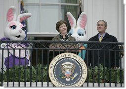 Mrs. Laura Bush and President George W. Bush welcome guests to the 2006 White House Easter Egg Roll, Monday, April 17, 2006, a tradition on the South Lawn of the White House since 1878. White House photo by Paul Morse
