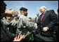 Vice President Dick Cheney greets soldiers at Fort Riley Army Base after delivering remarks at a rally for the troops, Tuesday, April 18, 2006. White House photo by David Bohrer