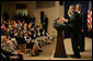 President George W. Bush speaks to the 2006 Recipients of the President's Environmental Youth Awards during a ceremony held in the Dwight D. Eisenhower Executive Office Building Thursday, April 20, 2006. Since 1971, the Environmental Protection Agency has sponsored the President’s Environmental Youth Awards. The program recognizes young people across America for projects which demonstrate their commitment to the environment. Young people in all 50 states and the U.S. territories are invited to participate in the program. White House photo by Kimberlee Hewitt