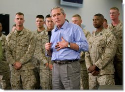 President George W. Bush speaks to Marines and their families following lunch inside the mess hall at the Marine Corps Air Ground Combat Center in Twentynine Palms, California, Sunday, April 23, 2006.  White House photo by Eric Draper