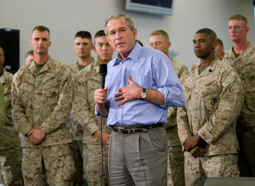 President George W. Bush speaks to Marines and their families following lunch inside the mess hall at the Marine Corps Air Ground Combat Center in Twentynine Palms, California, Sunday, April 23, 2006. White House photo by Eric Draper