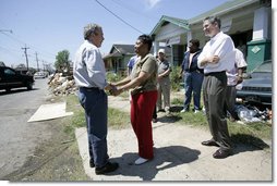 President George W. Bush greets homeowner Ethel Williams during a visit to her hurricane damaged home in the 9th Ward of New Orleans, Louisiana, Thursday, April 27, 2006.  White House photo by Eric Draper