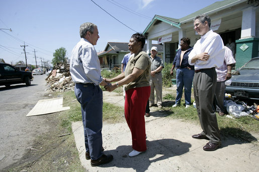 President George W. Bush greets homeowner Ethel Williams during a visit to her hurricane damaged home in the 9th Ward of New Orleans, Louisiana, Thursday, April 27, 2006. White House photo by Eric Draper