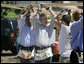 President George W. Bush helps volunteers from Operation Rebuilding Hands with the construction of a home in New Orleans, Louisiana, Thursday, April 27, 2006. Also pictured are Congressman Bill Jefferson, left, and New Orleans Mayor Ray Nagin. White House photo by Eric Draper