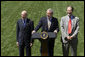 Addressing the press, President George W. Bush stands with Ed Lazear of the Council of Economic Advisors, left, and Al Hubbard of the National Economic Council, in the Rose Garden Friday, April 28, 2006. "I'm joined my two top White House economic advisors. The reason why is because we've had some very positive economic news today: the Commerce Department announced that our economy grew at an impressive 4.8 percent annual rate in the first quarter of this year. That's the fastest rate since 2003," said President Bush. "This rapid growth is another sign that our economy is on a fast track." White House photo by Eric Draper