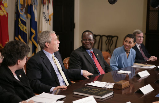 President George W. Bush meets with Darfur advocates, including former slave Simon Deng, in the Roosevelt Room Friday, April 28, 2006. "I just had an extraordinary conversation with fellow citizens from different faiths, all of who have come to urge our government to continue to focus on saving lives in Sudan," said the President to the press. "They agree with thousands of our citizens -- hundreds of thousands of our citizens -- that genocide in Sudan is unacceptable." White House photo by Paul Morse