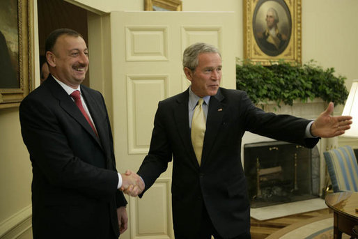 President George W. Bush welcomes President Ilham Aliyev of Azerbaijan to the Oval Office Friday, April 28, 2006. White House photo by Paul Morse