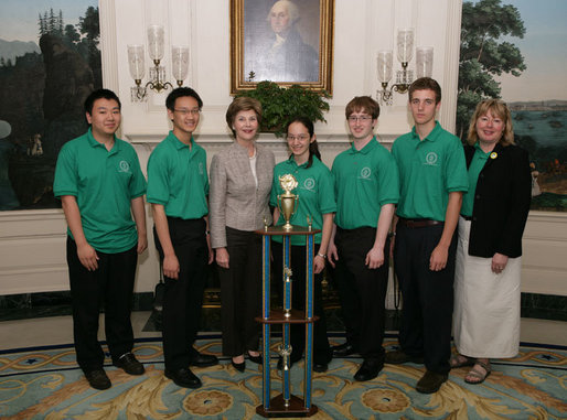 Mrs. Laura Bush welcomes the 2006 National Science Bowl Champions from State College, Pa., to the White House, Monday, May 1, 2006. From left to right are students Barry Liu, Jason Ma, Ylaine Gerardin, Galen Lynch, Francois Greet and their team coach Julie Gittings. The National Science Bowl, the nation’s largest science competition, is co-sponsored by the U.S. Department of Energy. White House Photo by Kimberlee Hewitt White House photo by Kimberlee Hewitt