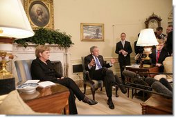 President George W. Bush speaks to members of the media during his meeting with German Chancellor Angela Merkel in the Oval Office at the White House, Wednesday, May 3, 2006.  White House photo by Eric Draper