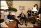 President George W. Bush speaks to members of the media during his meeting with German Chancellor Angela Merkel in the Oval Office at the White House, Wednesday, May 3, 2006. White House photo by Eric Draper