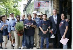 President George W. Bush stands with employees during a visit to Frager's Hardware store in the Capitol Hill neighborhood of Washington, D.C., Friday, May 5, 2006.  White House photo by Eric Draper