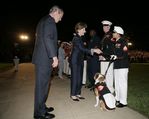 President George W. Bush and Laura Bush greet Marines following an Evening Parade, May 5, 2006, at the Marine Barracks in Washington, D.C. White House photo by Paul Morse