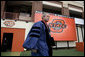 President George W. Bush walks onto the field of Boone Pickens Stadium at Oklahoma State University in Stillwater, OK where he delivered the commencement address to the class of 2006 on Saturday May 6, 2006. White House photo by Paul Morse