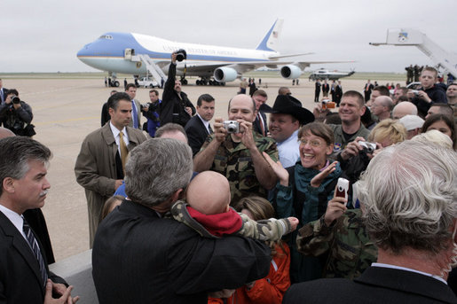 President George W. Bush greets families and personnel at Vance Air Force base in Enid, OK on Saturday May 6, 2006. White House photo by Paul Morse