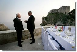 Vice President Dick Cheney talks with Croatian Prime Minister Ivo Sanader before a dinner meeting, Saturday, May 6, 2006, in the Old City of Dubrovnik, Croatia. The Vice President met with the Prime Minister to express U.S. support of Croatia's ambitions to become a member of the transatlantic community through integration into NATO and the European Community. White House photo by David Bohrer