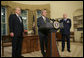 President George W. Bush announces his nomination of Gen. Michael V. Hayden as the next Director of the Central Intelligence Agency Monday, May 8, 2006, in the Oval Office as Ambassador John Negroponte, Director of National Intelligence, looks on. Said the President of Gen. Hayden: "He's the right man to lead the CIA at this critical moment in our nation's history." White House photo by Paul Morse