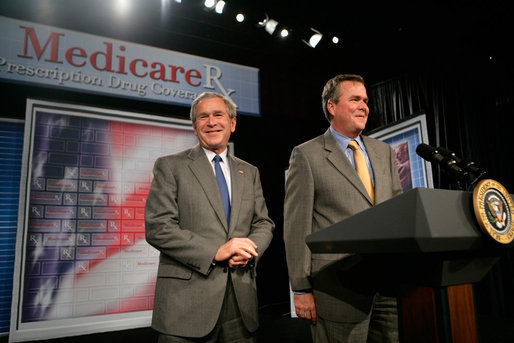 President George W. Bush is introduced by his brother Florida Governor Jeb Bush before delivering remarks on the Medicare Prescription Drug Benefit in Sun City Center, Florida, Tuesday, May 9, 2006. White House photo by Eric Draper