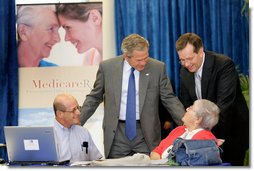 President George W. Bush and Health and Human Services Secretary Mike Leavitt with seniors at a Medicare Prescription Drug Benefit Enrollment Event at Broward Community College in Coconut Creek, Fla., Tuesday, May 9, 2006.  White House photo by Eric Draper