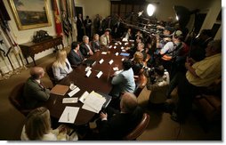Members of the media gather as President George W. Bush meets with Victims of Identity Theft Wednesday, May 10, 2006, in the Roosevelt Room of the White House. White House photo by Eric Draper
