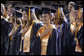 A student stands for the playing of the national anthem during the commencement ceremonies at Mississippi Gulf Coast Community College in Biloxi, Miss., Thursday, May 11, 2006. "You have sent a message and I came with a message of my own: This nation honors your dedication," said the President of the students' determination to graduate and help each other after Hurricane Katrina. "We're inspired by your optimism, and we'll help this great state of Mississippi rebuild." White House photo by Paul Morse