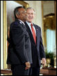 President George W. Bush and Durai Pandithurai of Cedar Hill, Texas, stand together for the presentation of the President's Volunteer Service Award in the East Room Friday, May 12, 2006. "The volunteers we recognize have brought care and outreach to veterans and men and women in uniform; they've helped children learn to read; they've extended food and shelter to hurricane victims in our Gulf Coast; they've helped underprivileged high school students prepare their SATs; and they've aided immigrants who have recently arrived in our country. They have served our nation in distinct ways, and in so doing have made America a better place to live," said the President. White House photo by Paul Morse