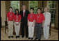 President George W. Bush stands with Top Team members of the MATHCOUNTS National Competition Monday, May 15, 2006, in the Oval Office of the White House. From left are: Jimmy Clark, 13, Falls Church, Va.; Divya Garg, 13, Annadale, Va.; President Bush; Brian Hamrick, 14, Annandale, Va.; Daniel Li, 14, of Fairfax, Va., and Barbara Burnett, Coach of the National Champion Team from Falls Church. White House photo by Paul Morse