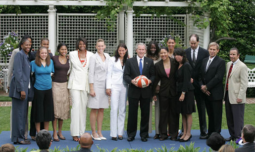 President George W. Bush poses with the Sacramento Monarchs, the 2005 Women's National Basketball Association Champions, Tuesday, May 16, 2006 during a congratulatory ceremony held in the East Garden at the White House. In September 2005, the Monarchs clinched their first WNBA Championship title by defeating the Connecticut Sun, 3 games to 1. White House photo by Kimberlee Hewitt