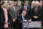 President George W. Bush signs H.R. 4297, the Tax Relief Extension Reconciliation Act of 2005, during bill-signing ceremonies Wednesday, May 17, 2006, on the South Lawn. White House photo by Paul Morse