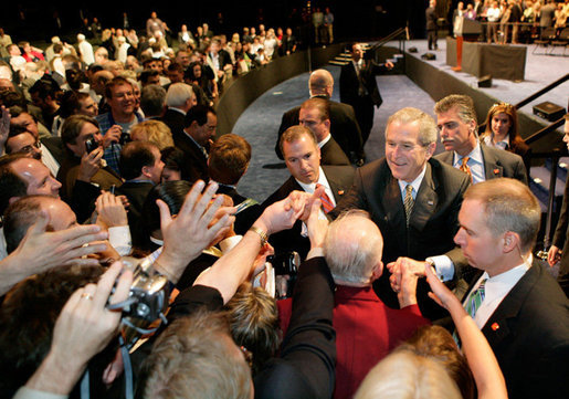 President George W. Bush greets the audience, Monday, May 22, 2006, following his remarks on the War on Terror to the National Restaurant Association gathering at Chicago's McCormick Place. White House photo by Eric Draper