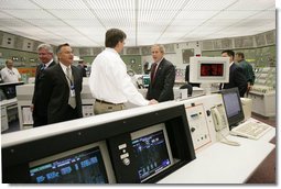 President George W. Bush meets workers in the control room at the Limerick Generating Station in Limerick, Pa., Wednesday, May 24, 2006 , where President Bush addressed an audience urging the the advancement of nuclear energy as part of a diversified U.S. energy policy.  White House photo by Kimberlee Hewitt