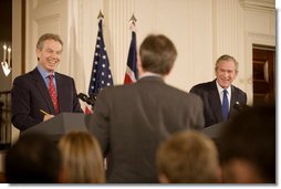 President George W. Bush and British Prime Minister Tony Blair participate in a joint news conference Thursday evening May 25, 2006 in the East Room of the White House, where the two leaders vowed their support to the new government of Iraq. White House photo by Eric Draper