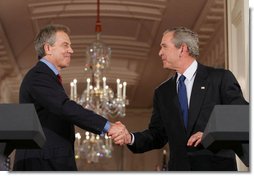 President George W. Bush and Prime Minister Tony Blair of Great Britain shake hands following a joint press availability Thursday, May 25, 2006, in the East Room of the White House during which they pledged their continued support for Iraq's new government. White House photo by Shealah Craighead
