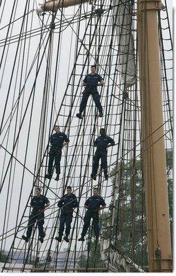 Crew members of the USCGC Eagle stand on the tall ship's rigging Thursday, May 25, 2006, near Fort Lesley J. McNair in Washington, D.C., during the Change of Command Ceremony for the Commandant of the United States Coast Guard. White House photo by Eric Draper