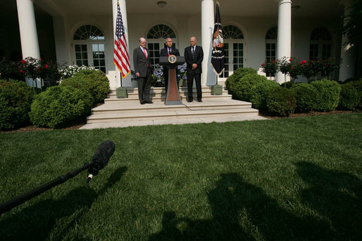 President George W. Bush stands with Treasury Secretary John Snow, left, and Henry Paulson, Chairman and Chief Executive Officer of the Goldman Sachs Group, as he announces his nomination of Mr. Paulson to succeed Secretary Snow. The announcement was made in the Rose Garden Tuesday, May 30, 2006. White House photo by Shealah Craighead