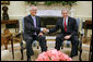 President George W. Bush meets with Senior Minister Goh Chok Tong of Singapore in the Oval Office of the White House, Friday, June 2, 2006. White House photo by Kimberlee Hewitt