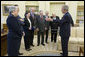President George W. Bush talks with members of the American Society of the Italian Legions of Merit in the Oval Office on Italian Independence Day, Friday, June 2, 2006. The society representatives visited President Bush to present a Medal of Honor commemorating the 40th anniversary of their organization. The same medal was also presented Italian President Carlo Ciampi in November. Standing with the President are, from left: Dr. Aileen Sirey of Chappaqua, N.Y.; Stephen Acunto of Mt. Vernon, N.Y.; Rosemarie Gallina-Santangelo of Rye, N.Y.; Dr. Lucio Caputo of New York City; Justice Dominic Massaro of Pelham Manor, N.Y.; Larry Auriana of Greenwich, Conn.; Dominic Frinzi of Milwaukee, Wis.; and Judge Bob Messa of Feasterville, Pa. (not pictured). White House photo by Kimberlee Hewitt