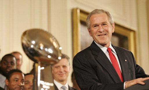 President George W. Bush stands next to the Super Bowl Trophy as he welcomes the Super Bowl Champion Pittsburgh Steelers to the White House, Friday, June 2, 2006, during a ceremony in the East Room to honor the Super Bowl champs. White House photo by Eric Draper