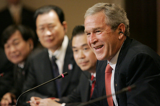 President George W. Bush shares a humorous exchange with members of the Chinese Leadership Program Fellows, Monday, June 5, 2006 at the Eisenhower Executive Office Building in Washington. White House photo by Eric Draper